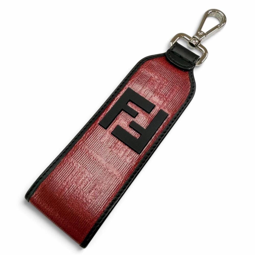 FENDI Zucca pattern rubberized leather keychain charm strap in red and black....
